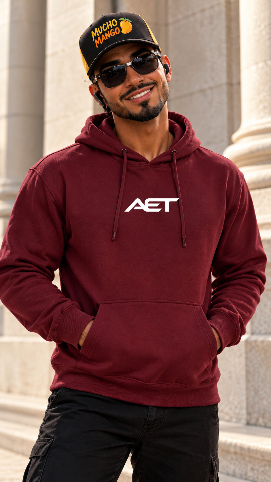Mucho Mango wearing the AET Core Hoodie in burgundy
