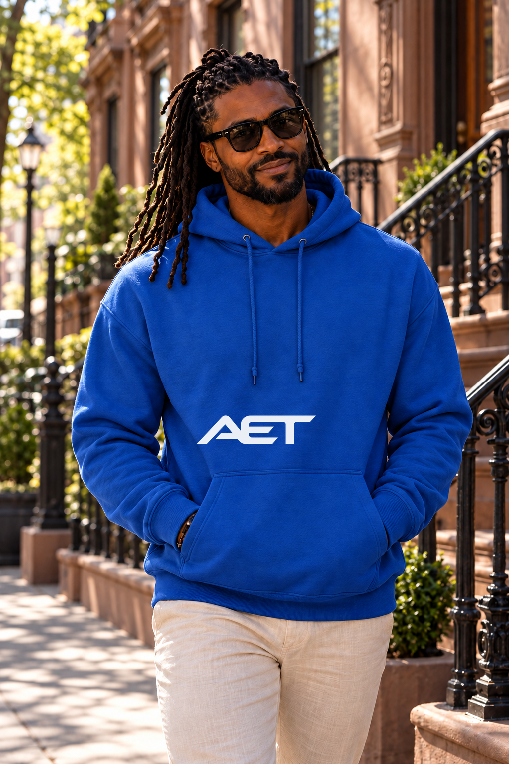 Kael wearing the AET Core Hoodie in Black, featuring the connected AET wordmark.